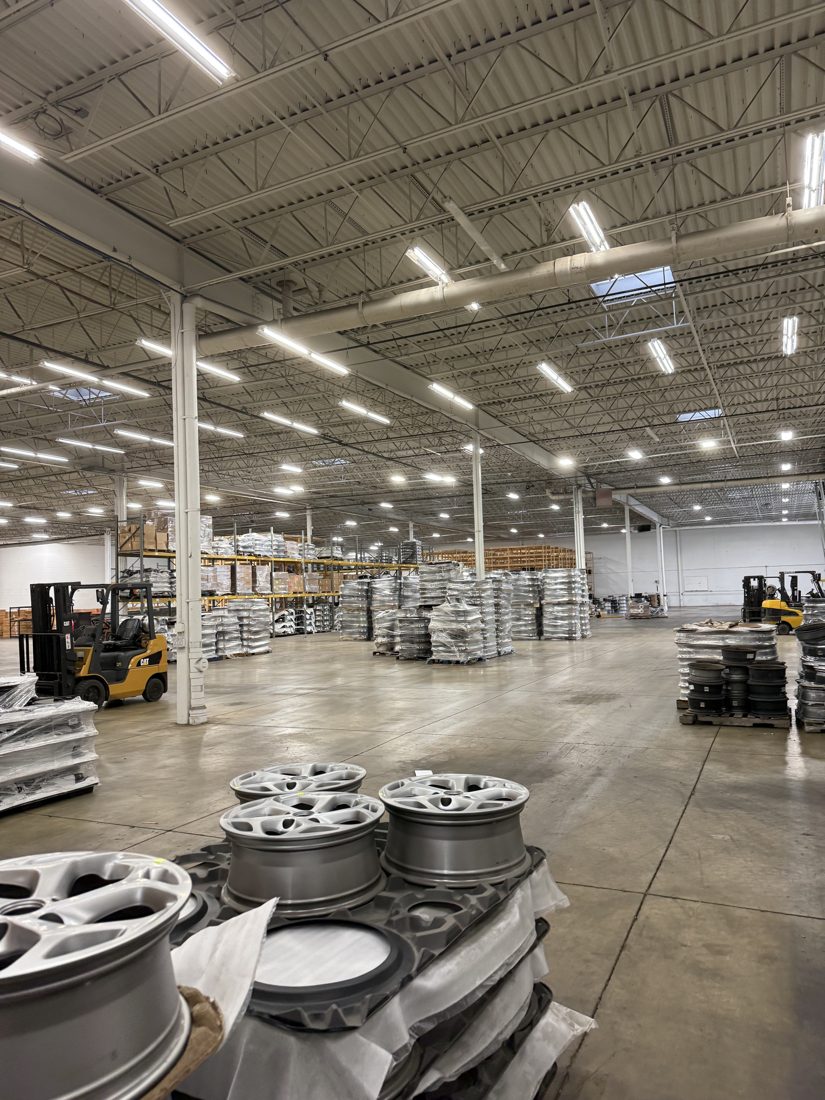 Wheel Management Systems warehouse floor with inventory and forklifts